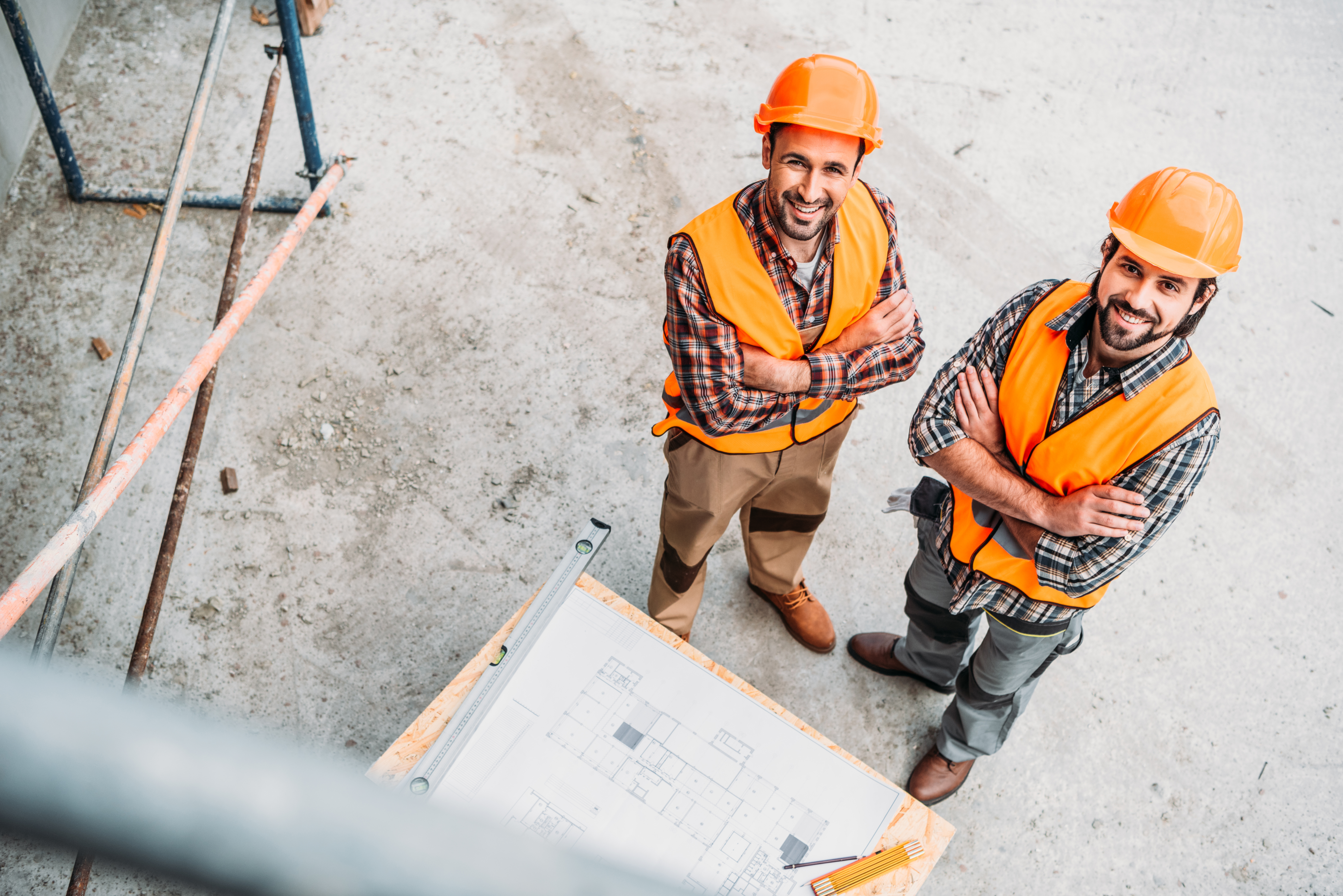 Construction industry workers reviewing plans